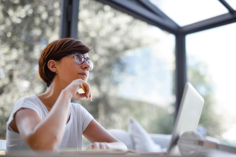 A woman researches facts about medical abortion on her laptop.